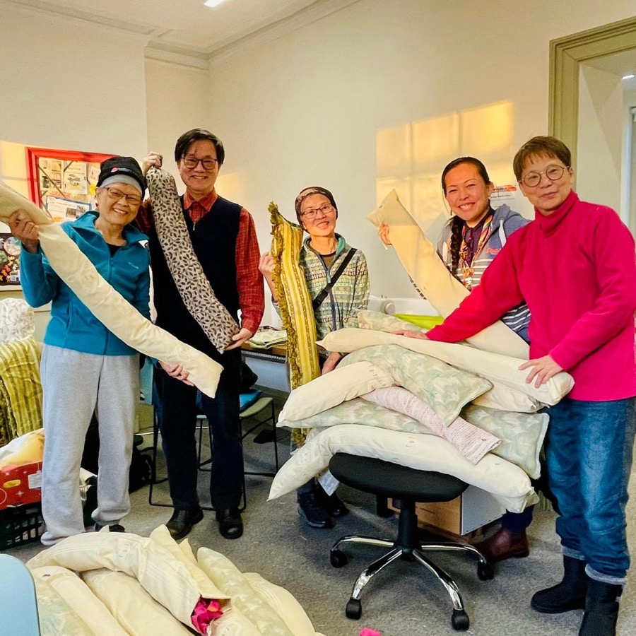 Volunteers sewing together at a Little A.R.K. Sew-cial session in South West London