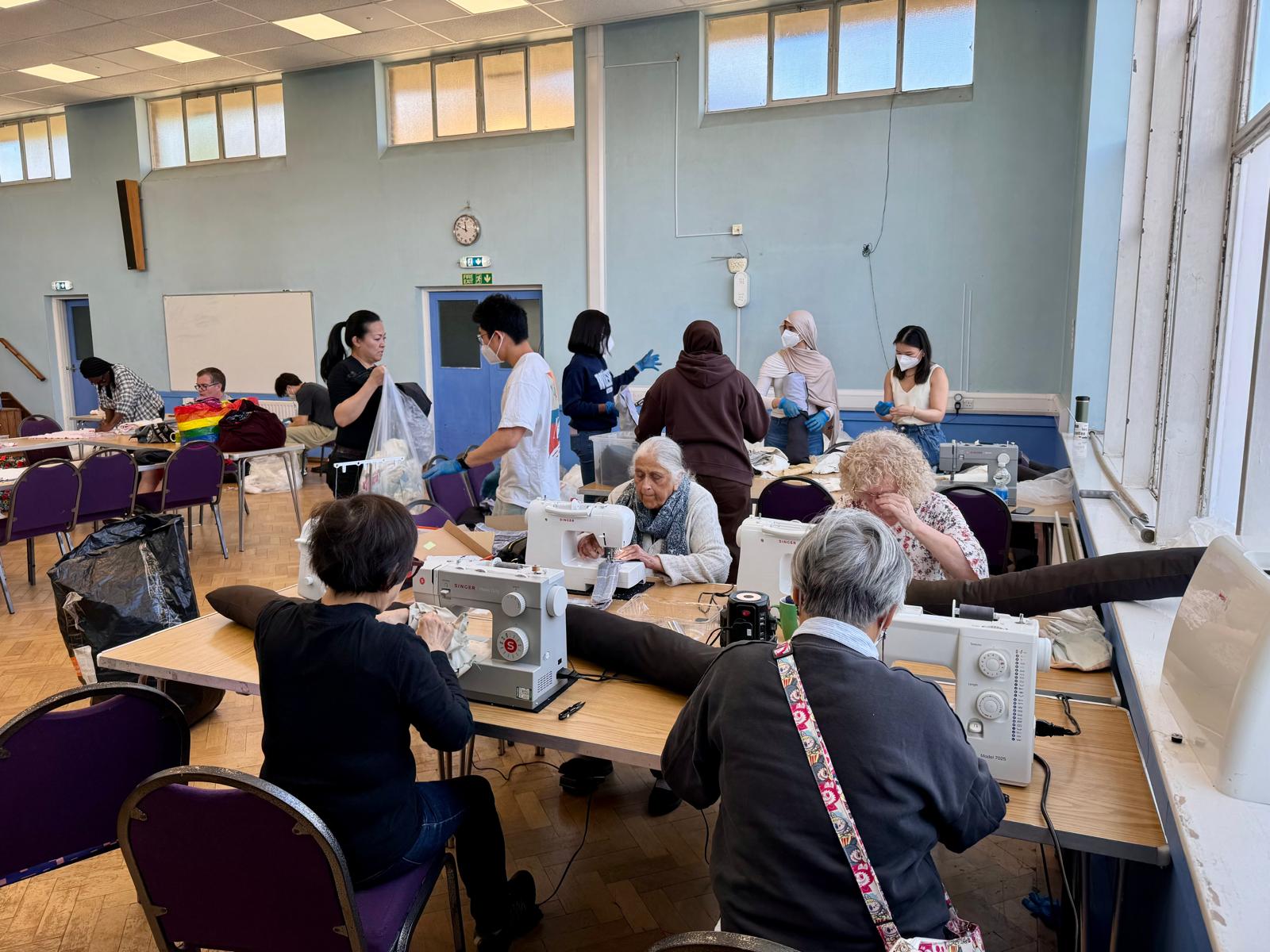 Volunteers sewing and crafting at Little A.R.K.'s South Wimbledon community hub